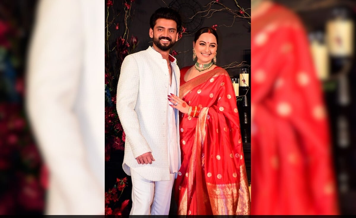 Newlyweds Sonakshi Sinha And Zaheer Iqbal Pose For The Paparazzi At The Reception Party